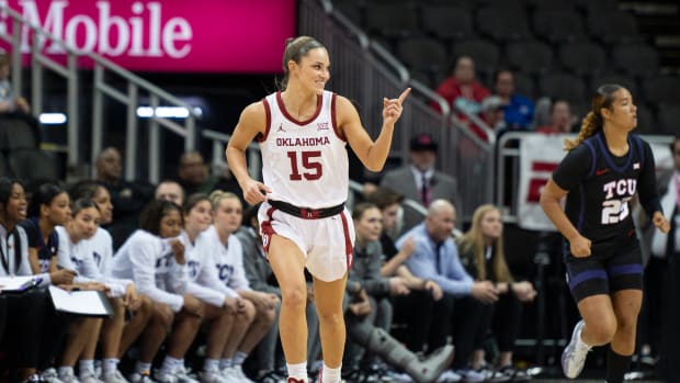 Mar 9, 2024; Kansas City, MO, USA; Oklahoma Sooners guard Lexy Keys (15) celebrates after making a basket against the Texas Christian Horned Frogs during the first half at T-Mobile Center. Mandatory Credit: Amy Kontras-USA TODAY Sports